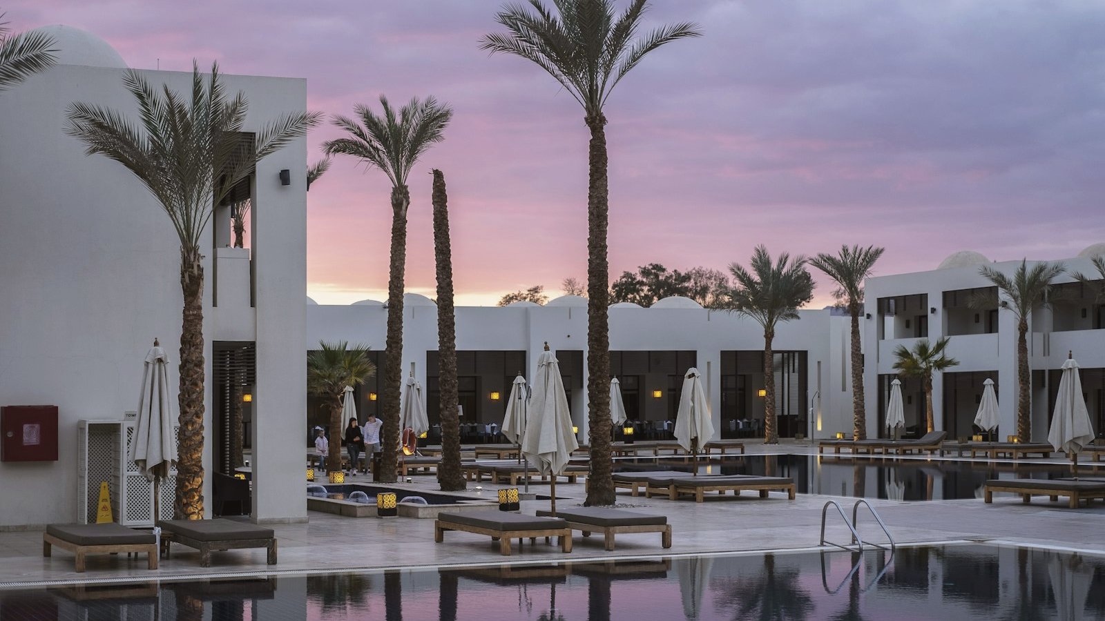 Mediterranean five-star resort at first light, no guests visible